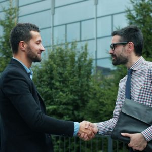 two men shaking hands
